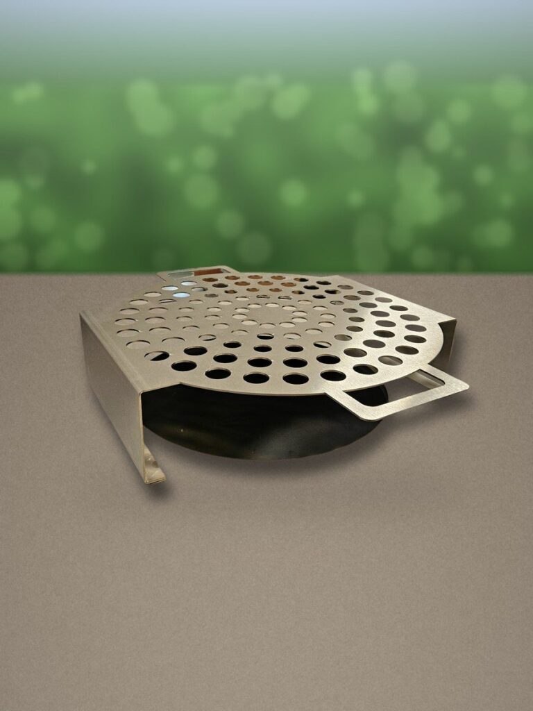 Grille à escargots en inox sur la plancha, dans le showroom